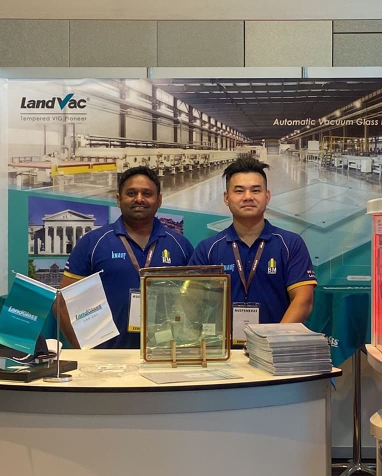 VGA team at a LandVac exhibition stand with glass samples